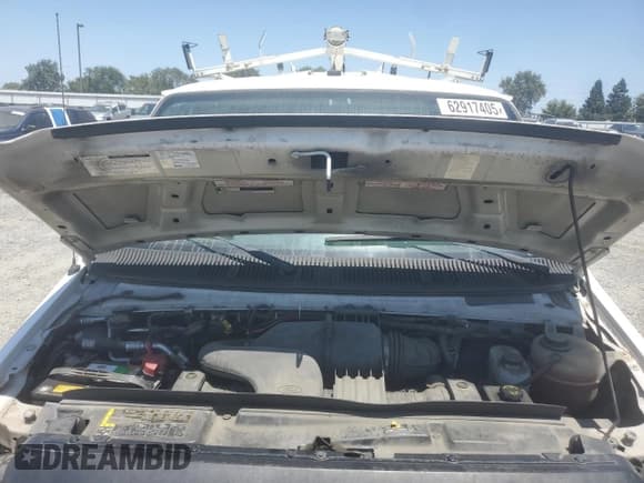 ✅ 2010 Ford Econoline Cargo Commercial • VIN: 1FTNE2EL4ADA72562 • Lot: 62917405. Listed on Copart with 82,186 mi. Free auction sales archive from the USA and detailed vehicle history report at DreamBid. Image 12.