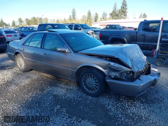 ✅ 1997 Cadillac Seville STS • VIN: 1G6KY5298VU810473 • Lot: 43444629. Listed on IAAI with 71,575 mi. Free auction sales archive from the USA and detailed vehicle history report at DreamBid. Image 1.