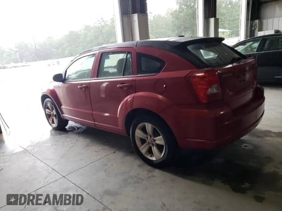 2011 Dodge Caliber Mainstreet with VIN 1B3CB3HA1BD157698, listed as a Copart auction lot 65272774 with 143,803 mi miles and Clean title. Bid and sale history available at DreamBid. Image 2.