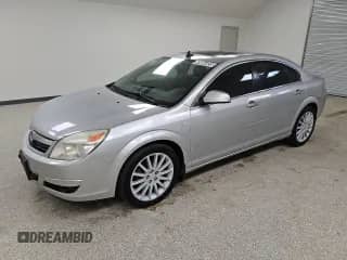 2007 Saturn Aura XR z VIN 1G8ZV57777F158782, wystawiony jako Copart lot #69064035 z przebiegiem 142 882 mil mil oraz Czysty tytuł • Clean title. Historia ofert i sprzedaży dostępna na DreamBid. Obrazek 1.