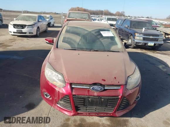 ✅ 2014 Ford Focus Titanium • VIN: 1FADP3N27EL117854 • Лот: 43677950. Опубликован ранее на IAAI с пробегом 218 147 миль. Бесплатный доступ к архиву аукционных продаж из США и подробный отчёт об истории автомобиля на DreamBid. Изображение 13.