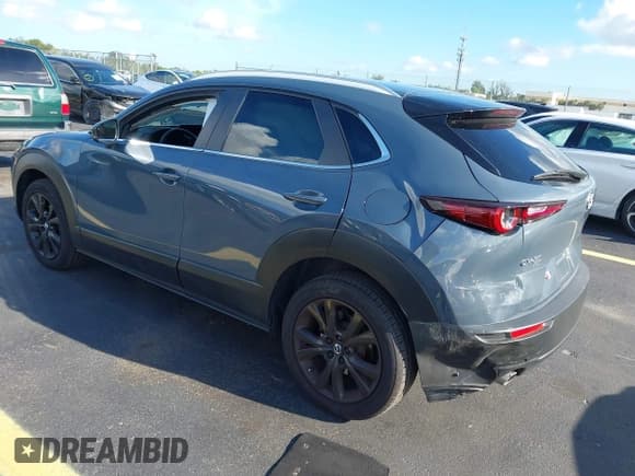 ✅ 2023 Mazda CX-30 S Carbon Edition • VIN: 3MVDMBCM6PM541737 • Lot: 42524854. Listed on IAAI with 55,093 mi. Free auction sales archive from the USA and detailed vehicle history report at DreamBid. Image 3.