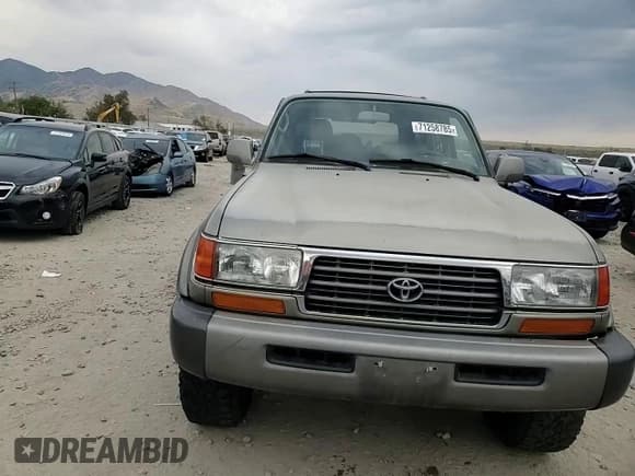 ✅ 1997 Toyota Land Cruiser • VIN: JT3HJ85J6V0170911 • Лот: 71258785. Опубликован ранее на Copart с пробегом 206 192 миль. Бесплатный доступ к архиву аукционных продаж из США и подробный отчёт об истории автомобиля на DreamBid. Изображение 13.
