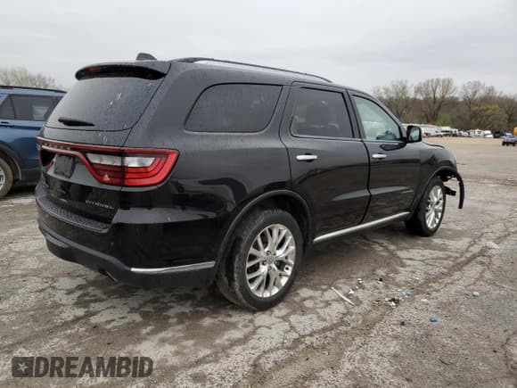✅ 2014 Dodge Durango Citadel • VIN: 1C4SDJET3EC592537 • Lot: 51525125. Listed on Copart with 129,804 mi. Free auction sales archive from the USA and detailed vehicle history report at DreamBid. Image 3.