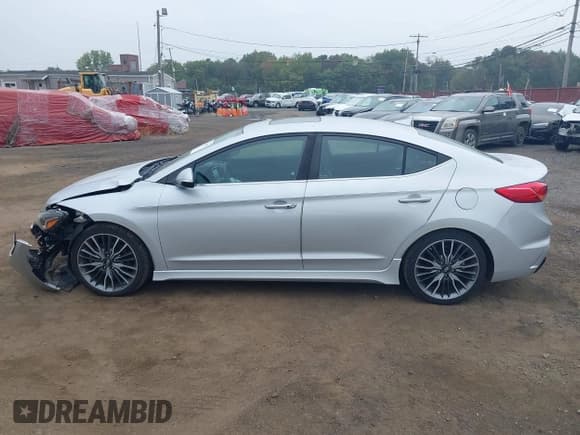 ✅ 2018 Hyundai Elantra Sport • VIN: KMHD04LB7JU681320 • Lot: 43249057. Listed on IAAI with 83,476 mi. Free auction sales archive from the USA and detailed vehicle history report at DreamBid. Image 14.