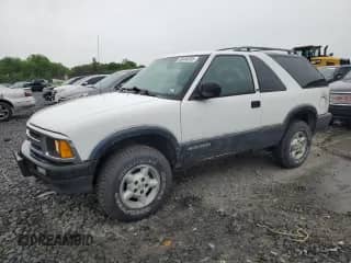1997 Chevrolet Blazer with VIN 1GNCT18W3VK101166, listed as a Copart auction lot 58400305 with 120,292 mi miles and Salvage title. Bid and sale history available at DreamBid. Image 1.