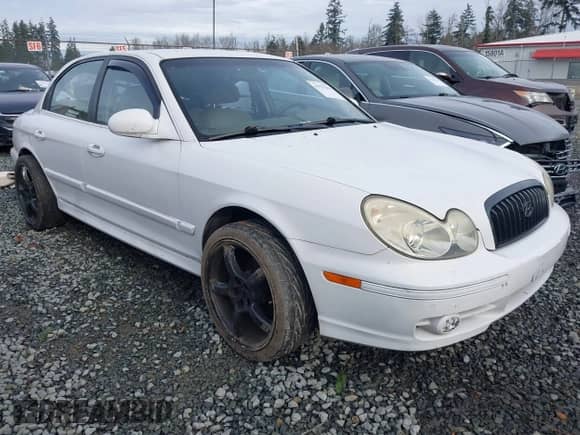 2004 Hyundai Sonata GLS with VIN KMHWF35H94A014600, listed as a IAAI auction lot 41031062 with 128,512 mi miles and . Bid and sale history available at DreamBid. Image 1.