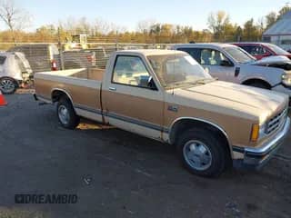 ✅ 1986 Chevrolet S-10 • VIN: 1GCCS14R2G2104591 • Lot: 43591395. Wystawiony na IAAI z przebiegiem 59 414 mil. Bezpłatny archiwum sprzedaży aukcyjnych z USA i szczegółowy raport historii pojazdu na DreamBid. Zdjęcie 1.