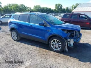 ✅ 2017 Ford Escape SE • VIN: 1FMCU0GD7HUE77583 • Lot: 43035853. Listed on IAAI with 70,398 mi. Free auction sales archive from the USA and detailed vehicle history report at DreamBid. Image 1.