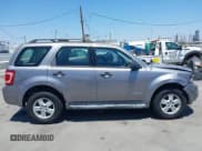 ✅ 2008 Ford Escape XLS • VIN: 1FMCU02Z68KE49322 • Lot: 42818502. Listed on IAAI with 154,099 mi. Free auction sales archive from the USA and detailed vehicle history report at DreamBid. Image 13.