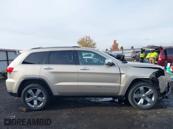 ✅ 2014 Jeep Grand Cherokee Limited • VIN: 1C4RJFBG6EC148645 • Lot: 43674764. Wystawiony na IAAI z przebiegiem 96 610 mil. Bezpłatny archiwum sprzedaży aukcyjnych z USA i szczegółowy raport historii pojazdu na DreamBid. Zdjęcie 13.