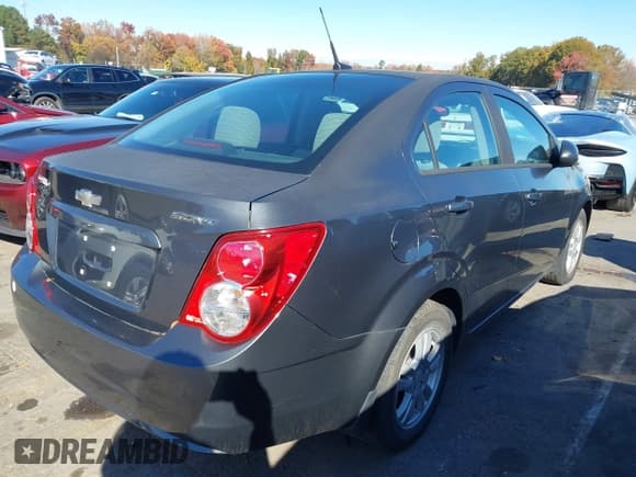 ✅ 2012 Chevrolet Sonic LS • VIN: 1G1JA5SHXC4177629 • Lot: 43661059. Listed on IAAI with 144,952 mi. Free auction sales archive from the USA and detailed vehicle history report at DreamBid. Image 4.