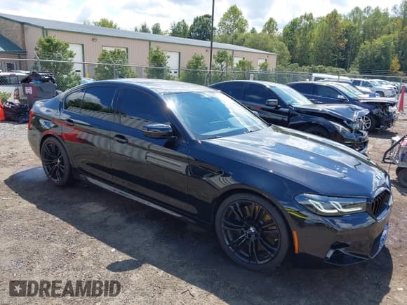 ✅ 2023 BMW M5 • VIN: WBS83CH01PCN06101 • Lot: 43116209. Listed on IAAI with 13,275 mi. Free auction sales archive from the USA and detailed vehicle history report at DreamBid. Image 1.