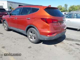 2018 Hyundai Santa Fe 2.4L z VIN 5XYZU3LB8JG523000, wystawiony jako IAAI lot #43263685 z przebiegiem 96 480 mil mil oraz . Historia ofert i sprzedaży dostępna na DreamBid. Obrazek 3.