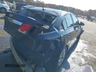 ✅ 2014 Chevrolet Cruze LS • VIN: 1G1PA5SH0E7332250 • Lot: 43606503. Listed on IAAI with 145,203 mi. Free auction sales archive from the USA and detailed vehicle history report at DreamBid. Image 4.