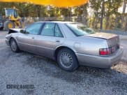 ✅ 1997 Cadillac Seville STS • VIN: 1G6KY5298VU810473 • Lot: 43444629. Listed on IAAI with 71,575 mi. Free auction sales archive from the USA and detailed vehicle history report at DreamBid. Image 3.