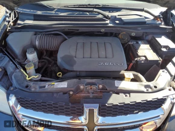 ✅ 2014 Dodge Grand Caravan SE • VIN: 2C4RDGBG1ER389808 • Lot: 86873415. Wystawiony na Copart z przebiegiem 172 800 mil. Bezpłatny archiwum sprzedaży aukcyjnych z USA i szczegółowy raport historii pojazdu na DreamBid. Zdjęcie 12.