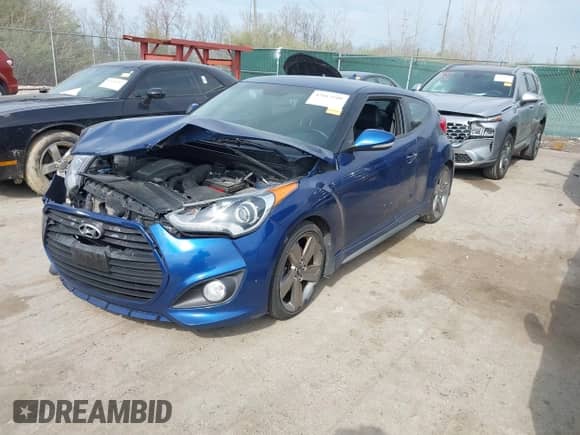 2015 Hyundai Veloster Turbo R-Spec z VIN KMHTC6AE1FU241628, wystawiony jako IAAI lot #42013008 z przebiegiem 110 357 mil mil oraz . Historia ofert i sprzedaży dostępna na DreamBid. Obrazek 2.