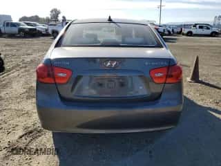 2009 Hyundai Elantra GLS z VIN KMHDU46D79U722672, wystawiony jako Copart lot #71370544 z przebiegiem 145 386 mil mil oraz Szkoda całkowita • Salvage title. Historia ofert i sprzedaży dostępna na DreamBid. Obrazek 6.