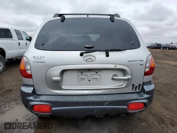 ✅ 2003 Hyundai Santa Fe GLS • VIN: KM8SC13D33U450903 • Лот: 48351575. Размещён на Copart с пробегом 150 319 миль миль. Получите бесплатный доступ к архиву аукционных продаж из США и посмотрите подробный отчёт об истории автомобиля на DreamBid. Изображение 6.