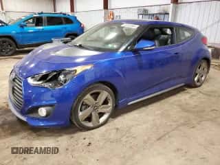 2015 Hyundai Veloster Turbo z VIN KMHTC6AE0FU217191, wystawiony jako Copart lot #45163364 z przebiegiem 39 253 mil mil oraz . Historia ofert i sprzedaży dostępna na DreamBid. Obrazek 1.