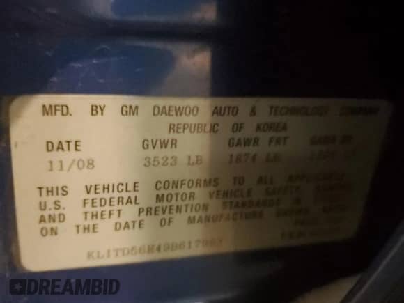 2009 Chevrolet Aveo 1LT z VIN KL1TD56E49B617993, wystawiony jako Copart lot #41340425 z przebiegiem 127 460 mil mil oraz Szkoda całkowita • Salvage title. Historia ofert i sprzedaży dostępna na DreamBid. Obrazek 13.