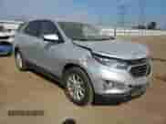 2018 Chevrolet Equinox LT с VIN 2GNAXJEV7J6263922, выставлен на аукционе Copart как лот 71521165 с пробегом 74 123 миль миль и Списание • Salvage title. История ставок и продаж доступна на DreamBid. Изображение 4.