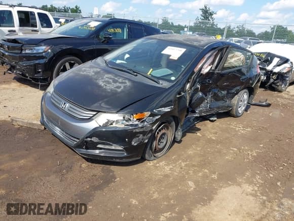 ✅ 2011 Honda Insight LX • VIN: JHMZE2H59BS000024 • Лот: 42957798. Опубликован ранее на IAAI с пробегом Не указан. Бесплатный доступ к архиву аукционных продаж из США и подробный отчёт об истории автомобиля на DreamBid. Изображение 2.