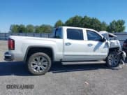 ✅ 2017 GMC Sierra 1500 Denali • VIN: 3GTU2PEJ0HG147836 • Lot: 43410221. Listed on IAAI with 98,619 mi. Free auction sales archive from the USA and detailed vehicle history report at DreamBid. Image 13.