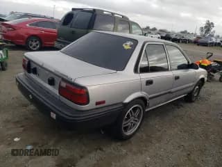 ✅ 1992 Toyota Corolla • VIN: 1NXAE91A1NZ346555 • Lot: 37697334. Listed on Copart with 232,988 mi. Free auction sales archive from the USA and detailed vehicle history report at DreamBid. Image 3.