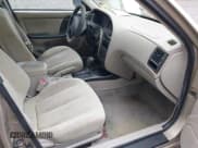 ✅ 2003 Hyundai Elantra GLS • VIN: KMHDN45DX3U511147 • Lot: 42596187. Wystawiony na IAAI z przebiegiem 173 852 mil. Bezpłatny archiwum sprzedaży aukcyjnych z USA i szczegółowy raport historii pojazdu na DreamBid. Zdjęcie 5.