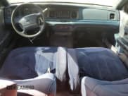 ✅ 1996 Ford Crown Victoria Police • VIN: 2FALP71W3TX170322 • Лот: 60784005. Опубликован ранее на Copart с пробегом 169 836 миль. Бесплатный доступ к архиву аукционных продаж из США и подробный отчёт об истории автомобиля на DreamBid. Изображение 8.