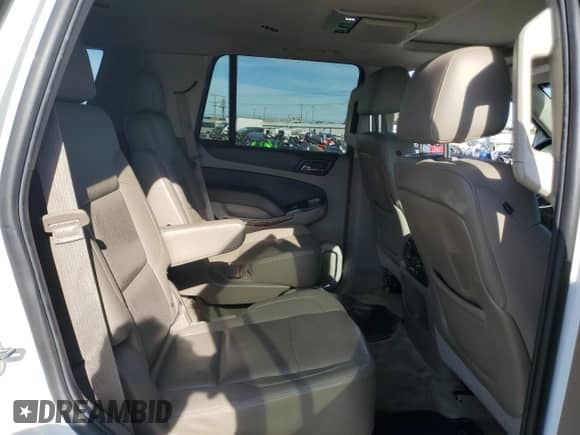 2015 Chevrolet Tahoe LTZ with VIN 1GNSKCKC1FR118128, listed as a Copart auction lot 89589135 with 129,932 mi miles and Salvage title. Bid and sale history available at DreamBid. Image 11.