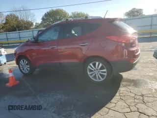 2013 Hyundai Tucson GLS z VIN KM8JUCAC6DU645099, wystawiony jako Copart lot #86072305 z przebiegiem 143 655 mil mil oraz Szkoda całkowita • Salvage title. Historia ofert i sprzedaży dostępna na DreamBid. Obrazek 2.