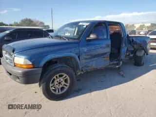 2004 Dodge Dakota Sport с VIN 1D7HG38N14S770031, выставлен на аукционе Copart как лот 72001434 с пробегом 131 547 миль миль и Списание • Salvage title. История ставок и продаж доступна на DreamBid. Изображение 1.