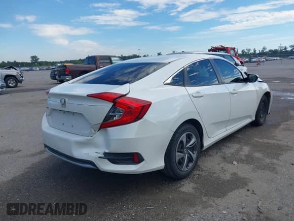 ✅ 2021 Honda Civic LX • VIN: 2HGFC2F63MH509186 • Lot: 43470365. Listed on IAAI with 81,122 mi. Free auction sales archive from the USA and detailed vehicle history report at DreamBid. Image 4.