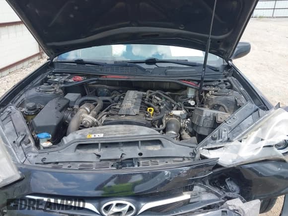 ✅ 2013 Hyundai Genesis Coupe 2.0T • VIN: KMHHT6KD0DU091858 • Lot: 42923154. Wystawiony na IAAI z przebiegiem 128 246 mil. Bezpłatny archiwum sprzedaży aukcyjnych z USA i szczegółowy raport historii pojazdu na DreamBid. Zdjęcie 10.