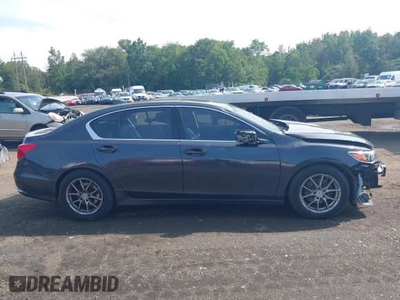 ✅ 2014 Acura RLX Technology • VIN: JH4KC1F5XEC006286 • Lot: 43179035. Wystawiony na IAAI z przebiegiem 130 921 mil. Bezpłatny archiwum sprzedaży aukcyjnych z USA i szczegółowy raport historii pojazdu na DreamBid. Zdjęcie 13.