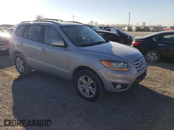 ✅ 2010 Hyundai Santa Fe Limited • VIN: 5NMSK3AB6AH367359 • Lot: 87106334. Listed on Copart with 186,886 mi. Free auction sales archive from the USA and detailed vehicle history report at DreamBid. Image 4.
