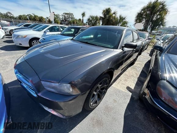 ✅ 2014 Dodge Charger SXT • VIN: 2C3CDXHG4EH161082 • Lot: 92727135. Listed on Copart with 173,920 mi. Free auction sales archive from the USA and detailed vehicle history report at DreamBid. Image 2.