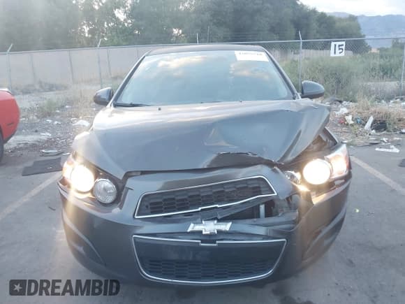 ✅ 2014 Chevrolet Sonic LT • VIN: 1G1JC5SH7E4167993 • Lot: 43055510. Listed on IAAI with 115,256 mi. Free auction sales archive from the USA and detailed vehicle history report at DreamBid. Image 12.