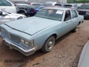 ✅ 1984 Oldsmobile Delta • VIN: 1G3AY69Y0EX383932 • Lot: 42109080. Listed on IAAI with 129,332 mi. Free auction sales archive from the USA and detailed vehicle history report at DreamBid. Image 2.