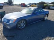 ✅ 2005 Cadillac XLR • VIN: 1G6YV34A855603428 • Lot: 42059074. Listed on IAAI with 55,034 mi. Free auction sales archive from the USA and detailed vehicle history report at DreamBid. Image 2.