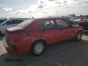✅ 1987 Alfa Romeo Milano • VIN: ZARDA1160H1051386 • Лот: 75195914. Опубликован ранее на Copart с пробегом 88 230 миль. Бесплатный доступ к архиву аукционных продаж из США и подробный отчёт об истории автомобиля на DreamBid. Изображение 3.