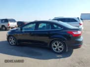 ✅ 2014 Ford Focus Titanium • VIN: 1FADP3J23EL237429 • Lot: 43358765. Listed on IAAI with 138,960 mi. Free auction sales archive from the USA and detailed vehicle history report at DreamBid. Image 14.