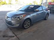 ✅ 2017 Hyundai Veloster Value Edition • VIN: KMHTC6AD4HU309804 • Lot: 43441272. Wystawiony na IAAI z przebiegiem 99 124 mil. Bezpłatny archiwum sprzedaży aukcyjnych z USA i szczegółowy raport historii pojazdu na DreamBid. Zdjęcie 2.