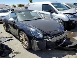 ✅ 2019 Porsche 911 4S • VIN: WP0BB2A99KS126019 • Лот: 60111334. Опубликован ранее на Copart с пробегом 25 012 миль. Бесплатный доступ к архиву аукционных продаж из США и подробный отчёт об истории автомобиля на DreamBid. Изображение 4.