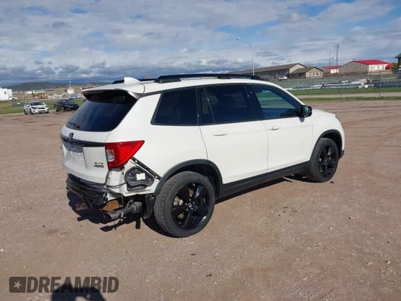✅ 2019 Honda Passport Elite • VIN: 5FNYF8H0XKB001472 • Лот: 42143890. Опубликован ранее на IAAI с пробегом 98 119 миль. Бесплатный доступ к архиву аукционных продаж из США и подробный отчёт об истории автомобиля на DreamBid. Изображение 4.