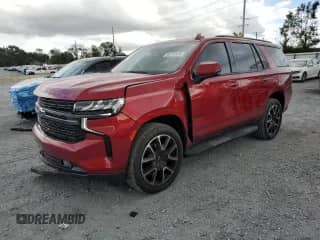 2021 Chevrolet Tahoe RST z VIN 1GNSKRKD0MR262570, wystawiony jako Copart lot #85742915 z przebiegiem 104 520 mil mil oraz Szkoda całkowita • Salvage title. Historia ofert i sprzedaży dostępna na DreamBid. Obrazek 1.