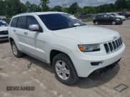 ✅ 2015 Jeep Grand Cherokee • VIN: 1C4RJEJM8FC674648 • Lot: 42785823. Listed on IAAI with 207,084 mi. Free auction sales archive from the USA and detailed vehicle history report at DreamBid. Image 1.
